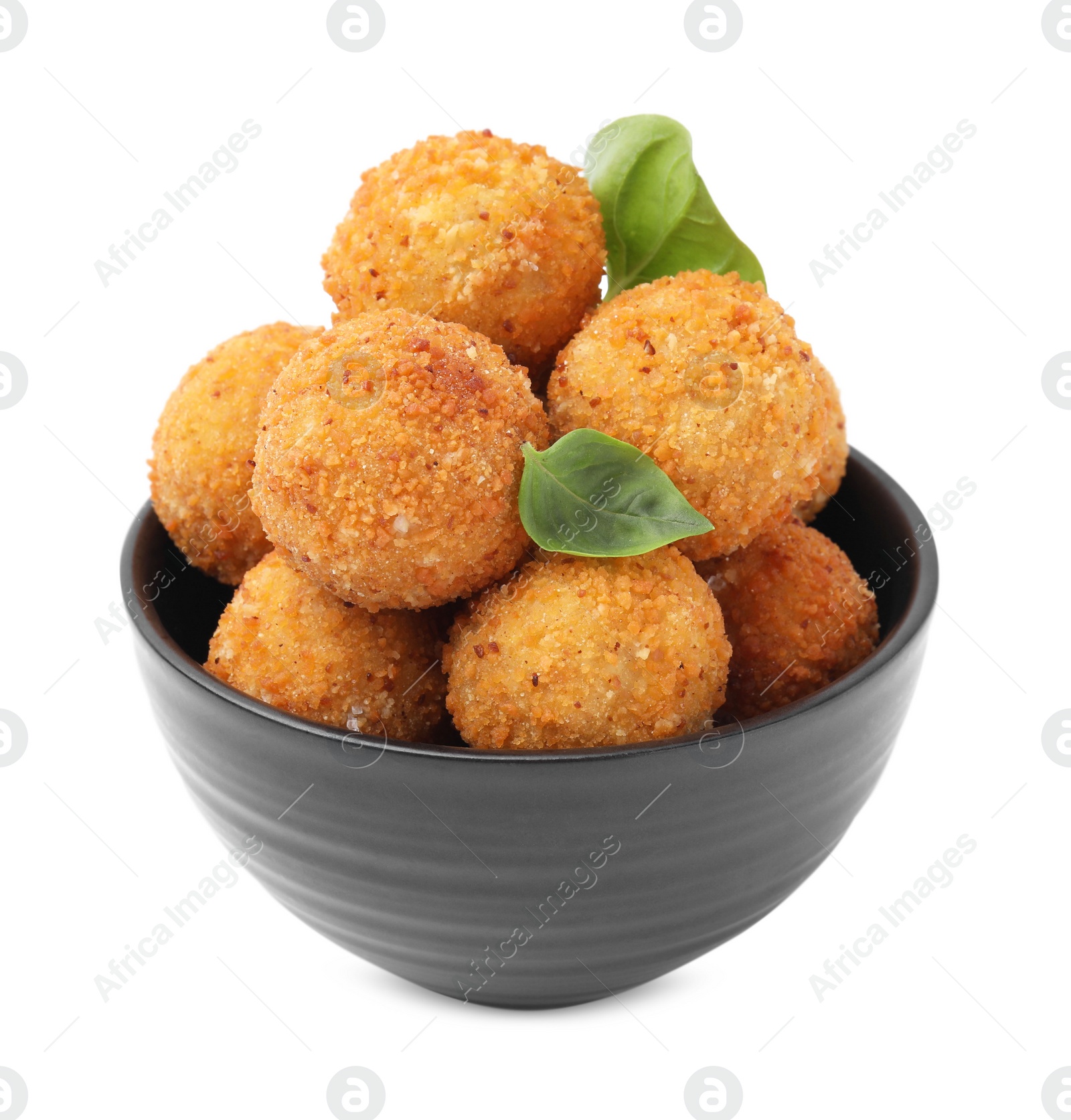 Photo of Bowl with delicious fried tofu balls and basil on white background