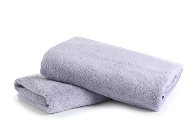 Fresh soft folded towels isolated on white