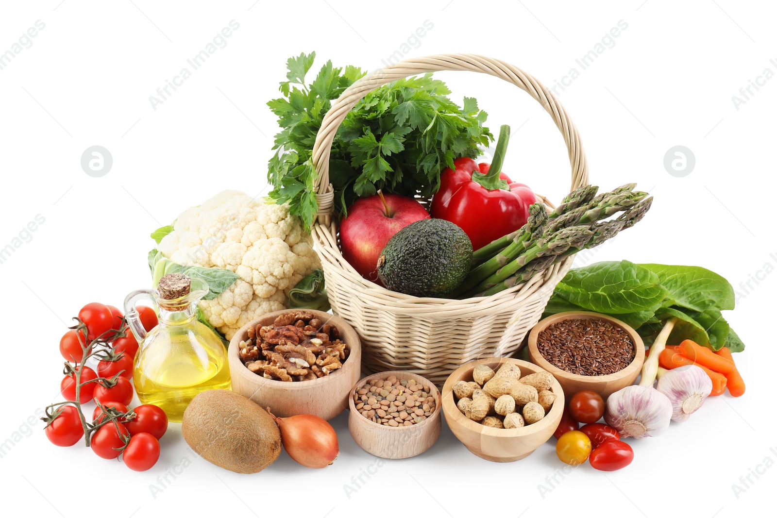 Photo of Healthy food. Basket with different fresh products isolated on white