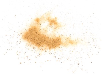 Photo of Brown dust scattered on white background, top view