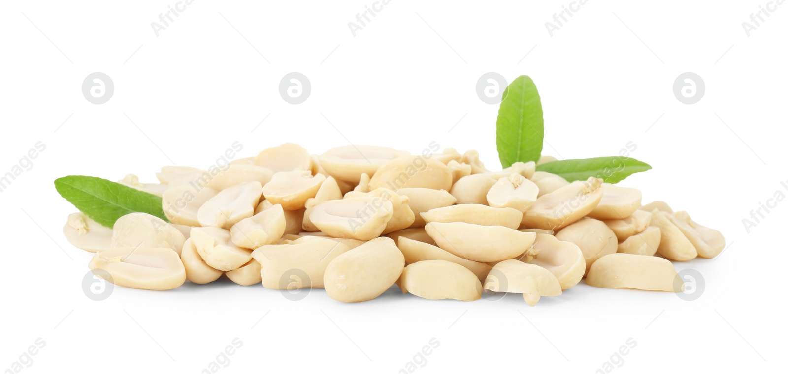 Photo of Fresh peeled peanuts and green leaves isolated on white