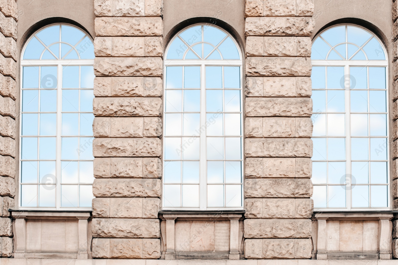 Photo of Beautiful view of building with arched windows