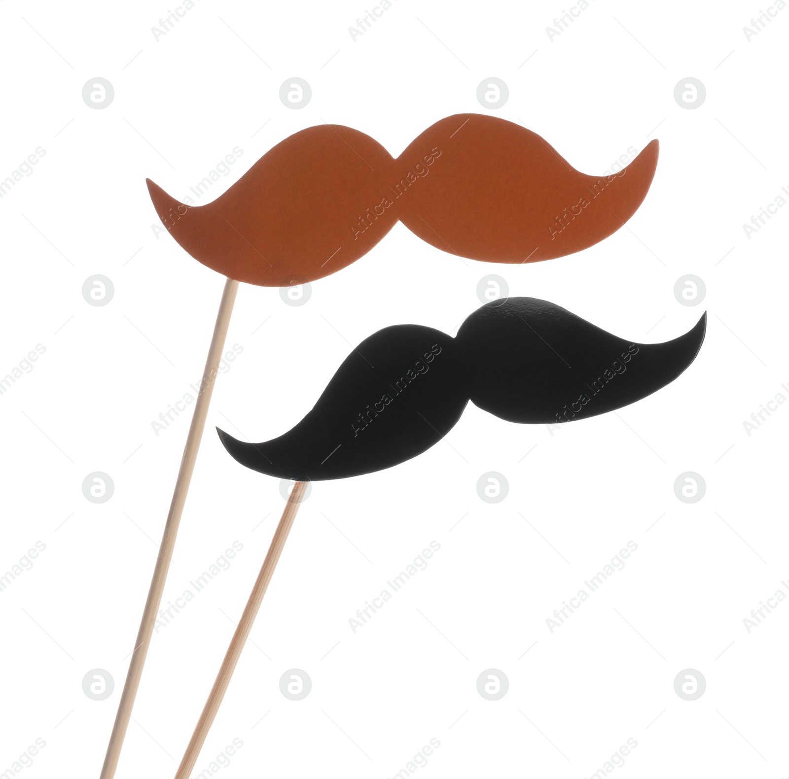 Photo of Fake paper mustaches on sticks against white background