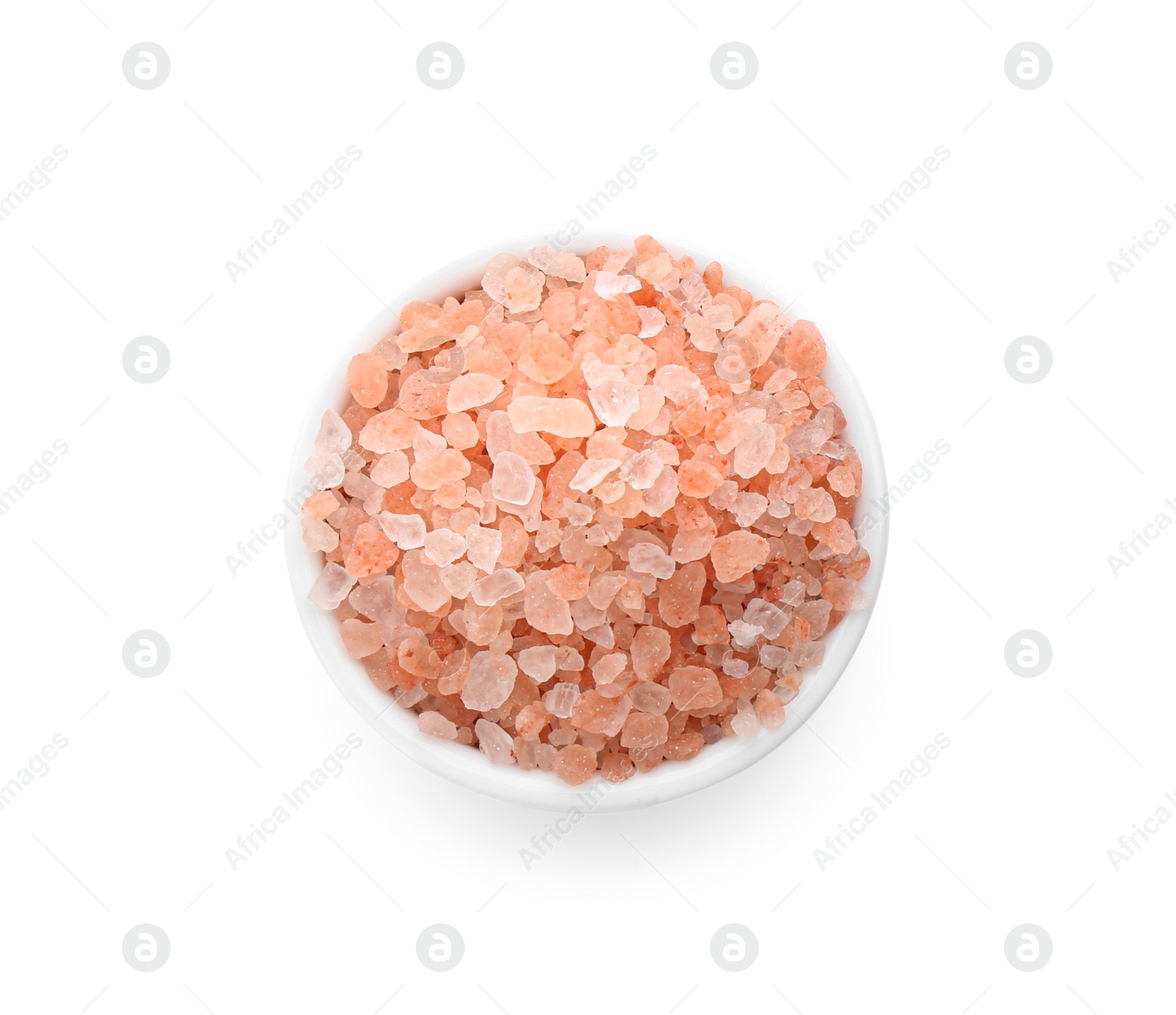 Photo of Pink himalayan salt in bowl isolated on white, top view