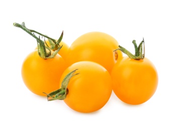 Photo of Delicious ripe yellow cherry tomatoes on white background