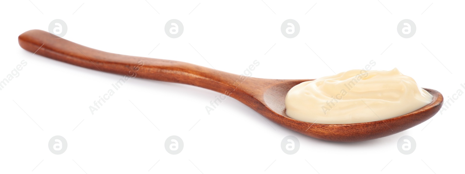 Photo of Wooden spoon with mayonnaise isolated on white