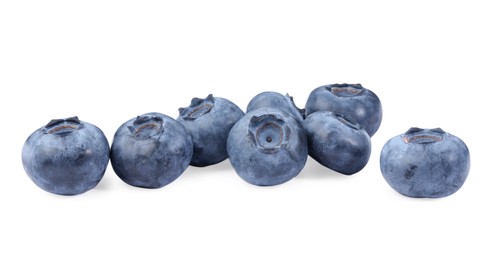 Photo of Many fresh ripe blueberries isolated on white