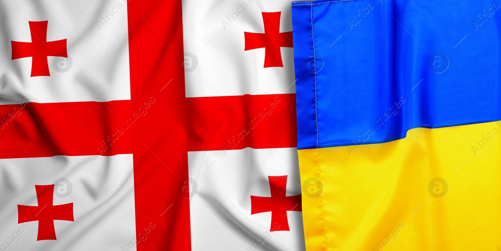 Image of National flags of Ukraine and Georgia as background, banner design