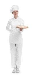 Happy chef in uniform holding empty wooden board on white background