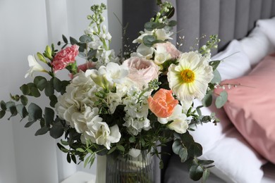 Photo of Bouquet of beautiful flowers in vase indoors, closeup