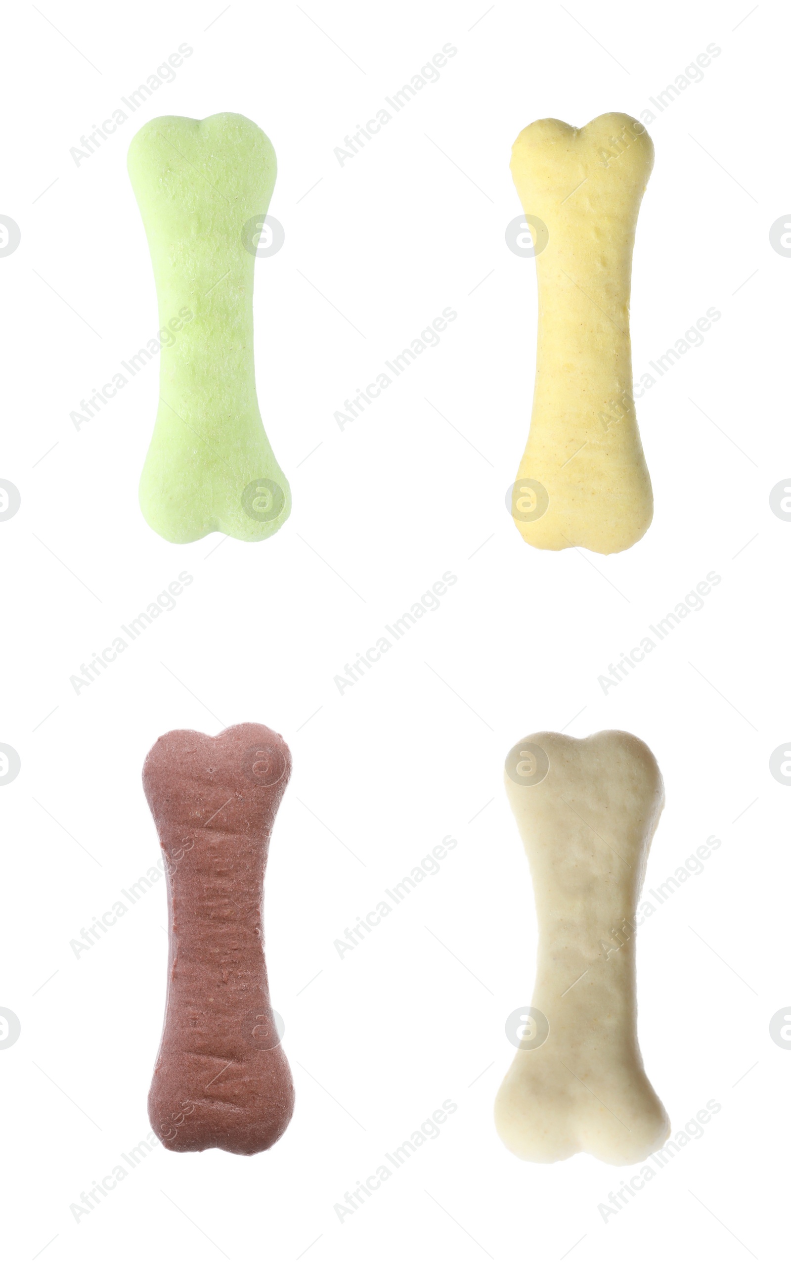 Image of Set of different bone shaped dog cookies on white background