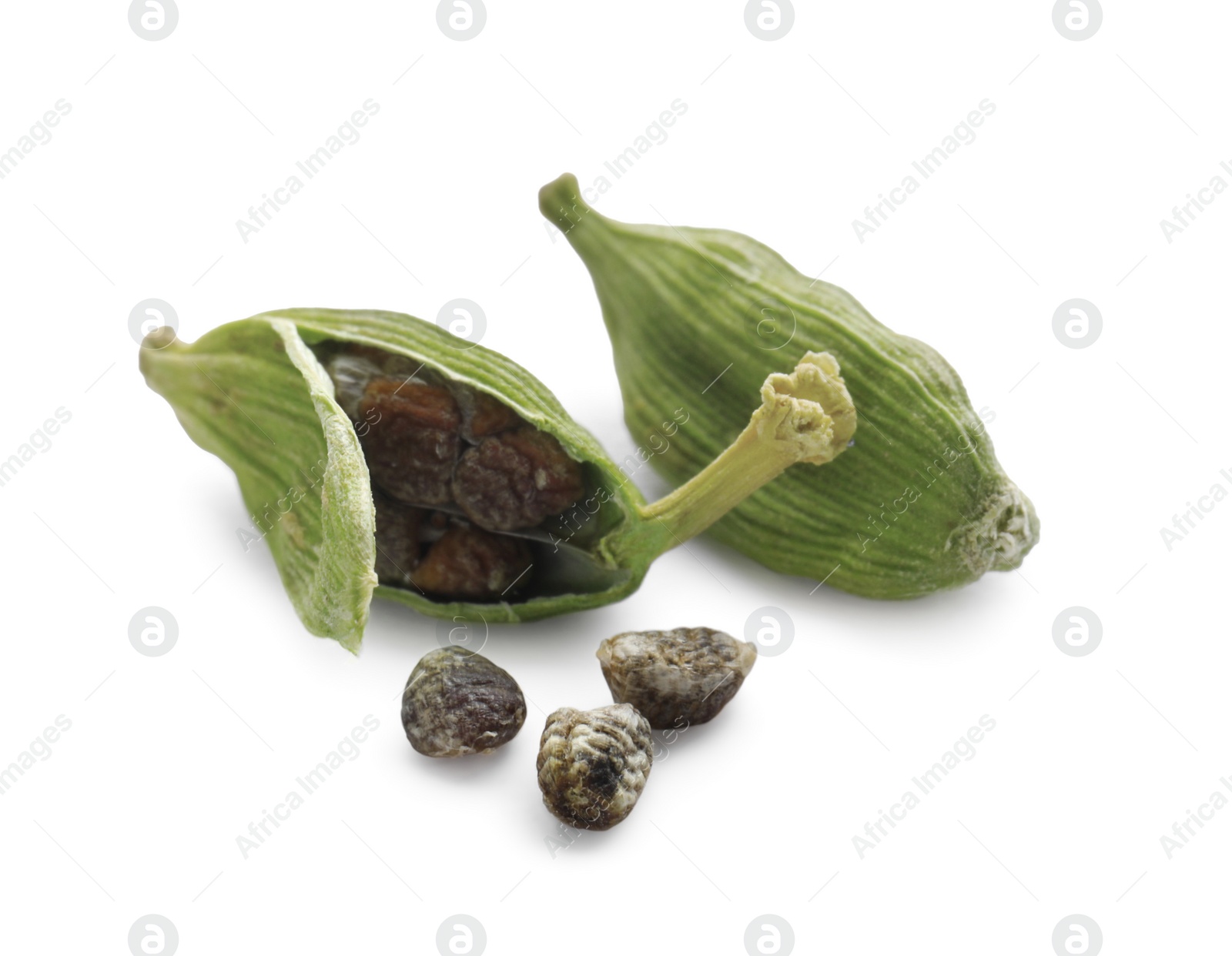 Photo of Dry green cardamom pods on white background, closeup