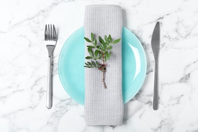 Photo of Beautiful table setting with napkin on marble background, top view