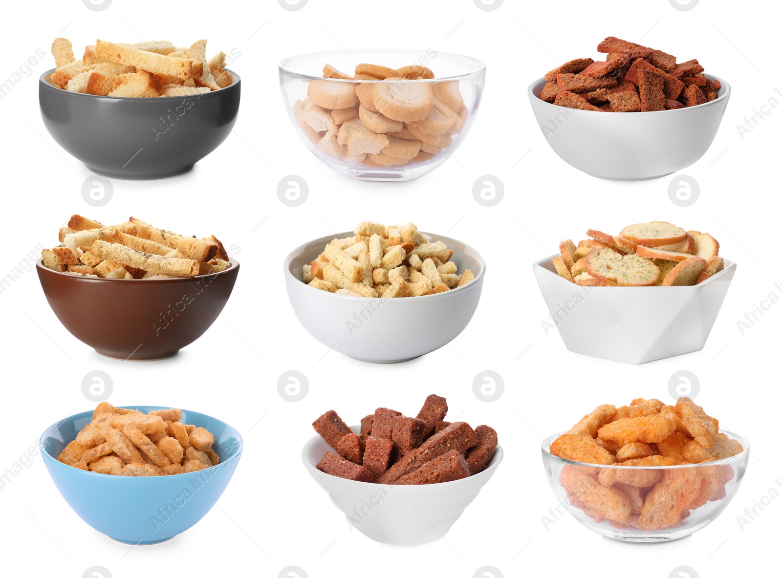 Image of Set with different delicious crispy rusks on white background