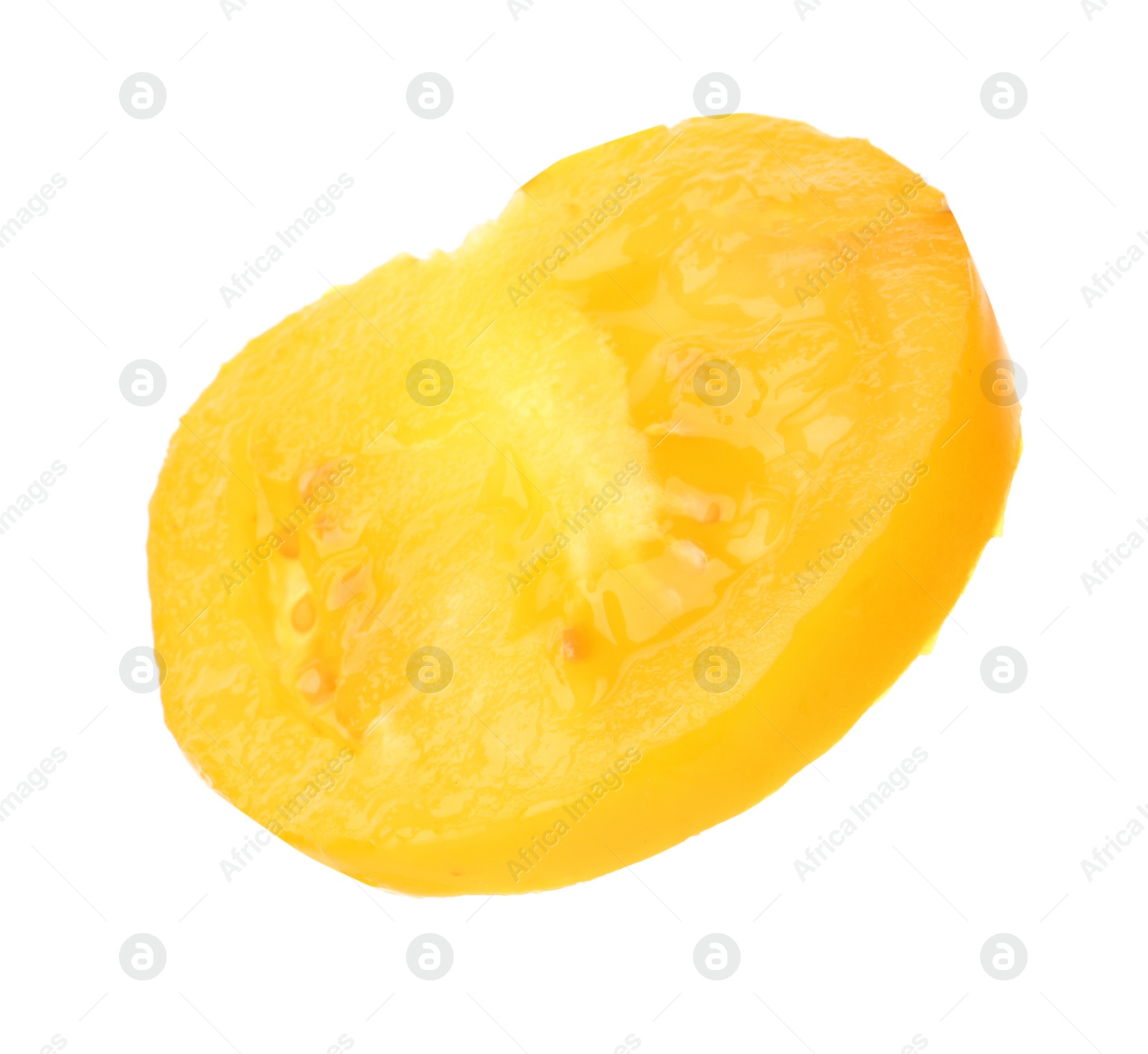 Photo of Slice of yellow tomato on white background