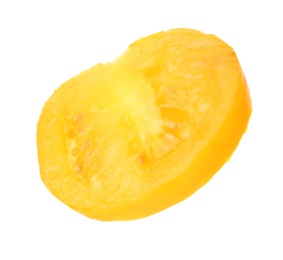 Photo of Slice of yellow tomato on white background