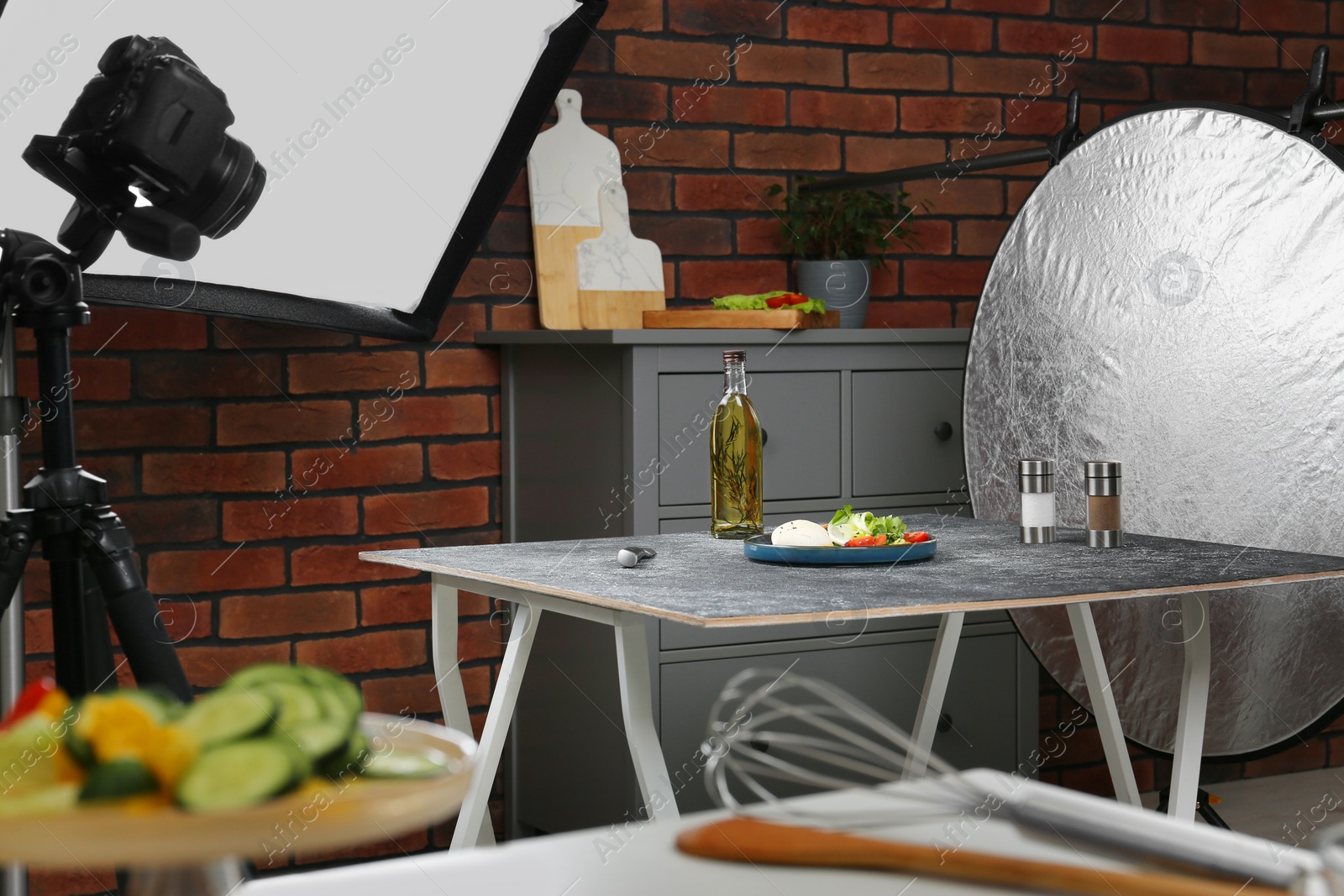 Photo of Composition with mozzarella salad on black table in professional photo studio. Food photography