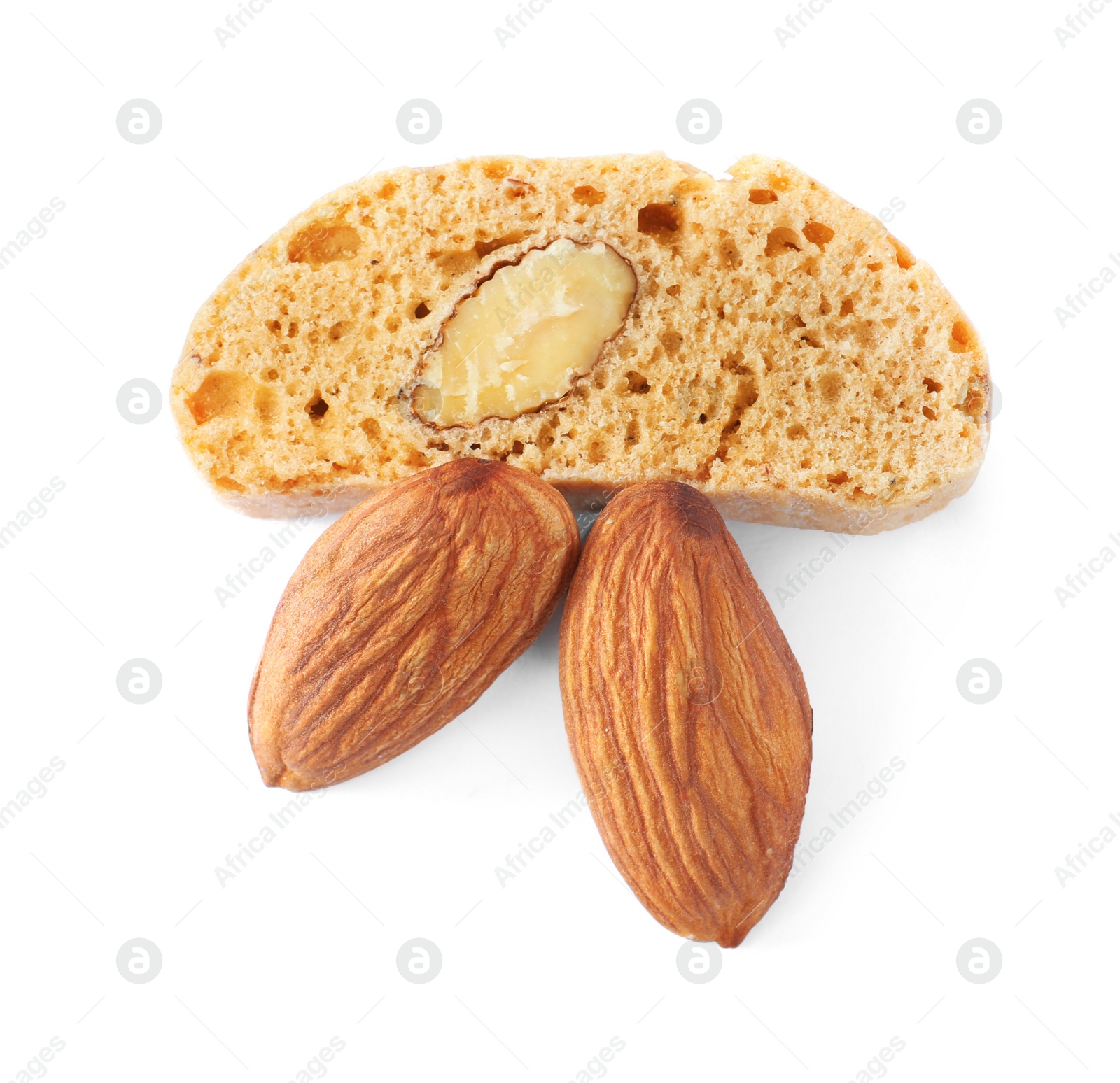 Photo of Slice of tasty cantucci and nuts on white background, top view. Traditional Italian almond biscuits