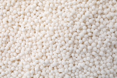 White tapioca pearls as background, top view