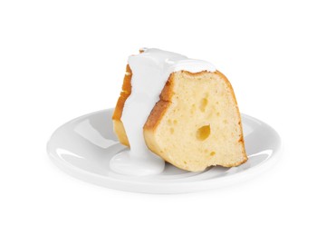 Piece of delicious homemade yogurt cake with cream on white background