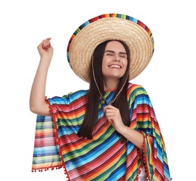 Photo of Young woman in Mexican sombrero hat and poncho dancing on white background