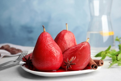 Delicious mulled wine poached pears served on table