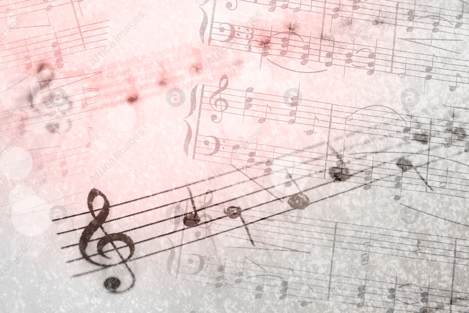 Image of Sheets with music notes as background, double exposure. Bokeh and color tone effects