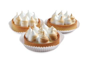 Photo of Tartlets with lemon curd and meringue isolated on white. Delicious dessert