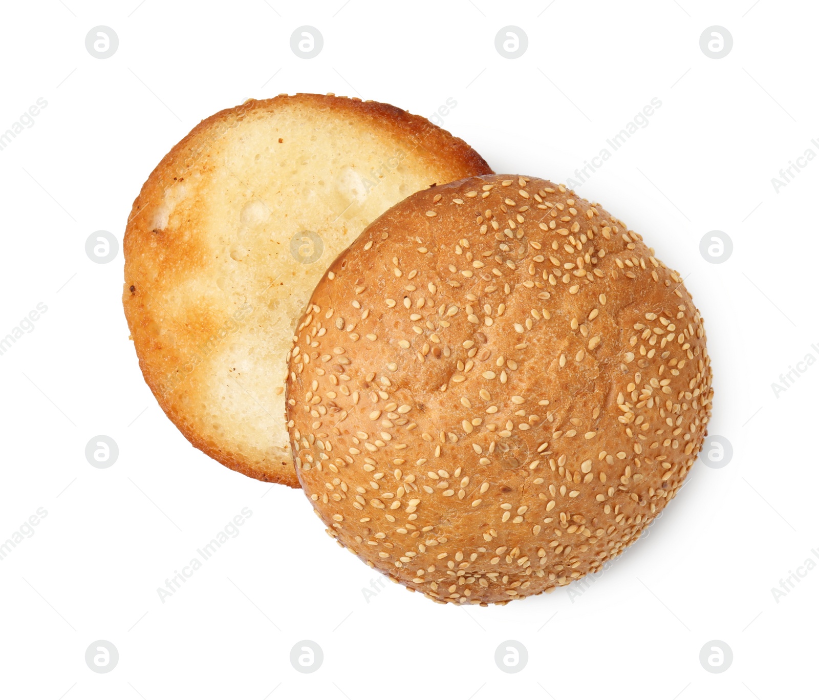 Photo of Halves of grilled burger bun isolated on white, top view