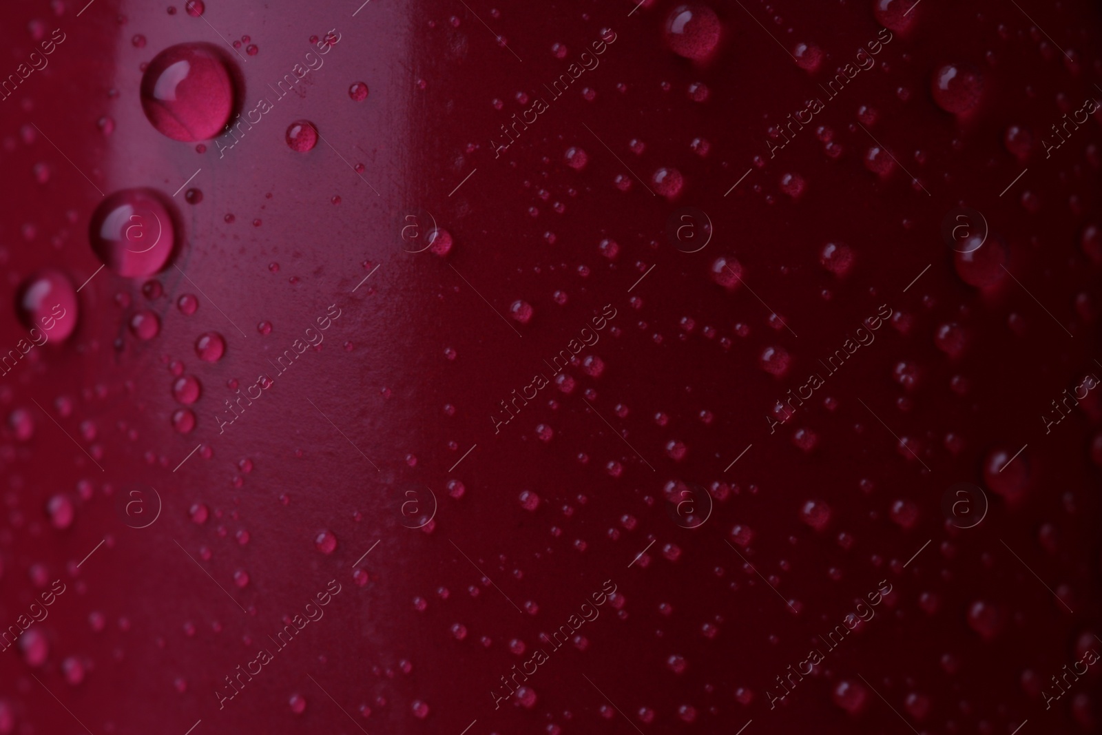 Photo of Texture of red lipstick with water drops as background, macro view