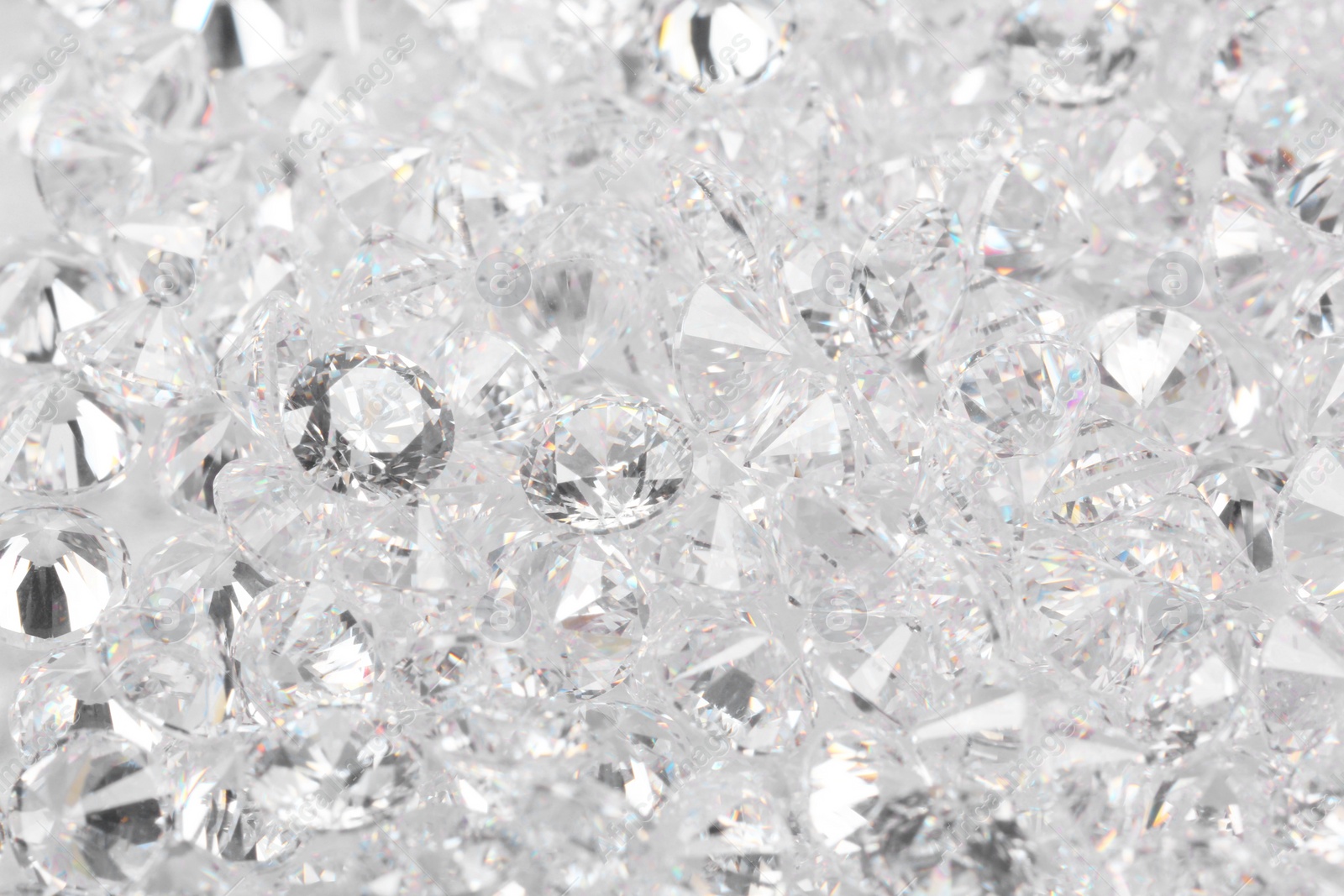 Photo of Many beautiful shiny diamonds as background, closeup