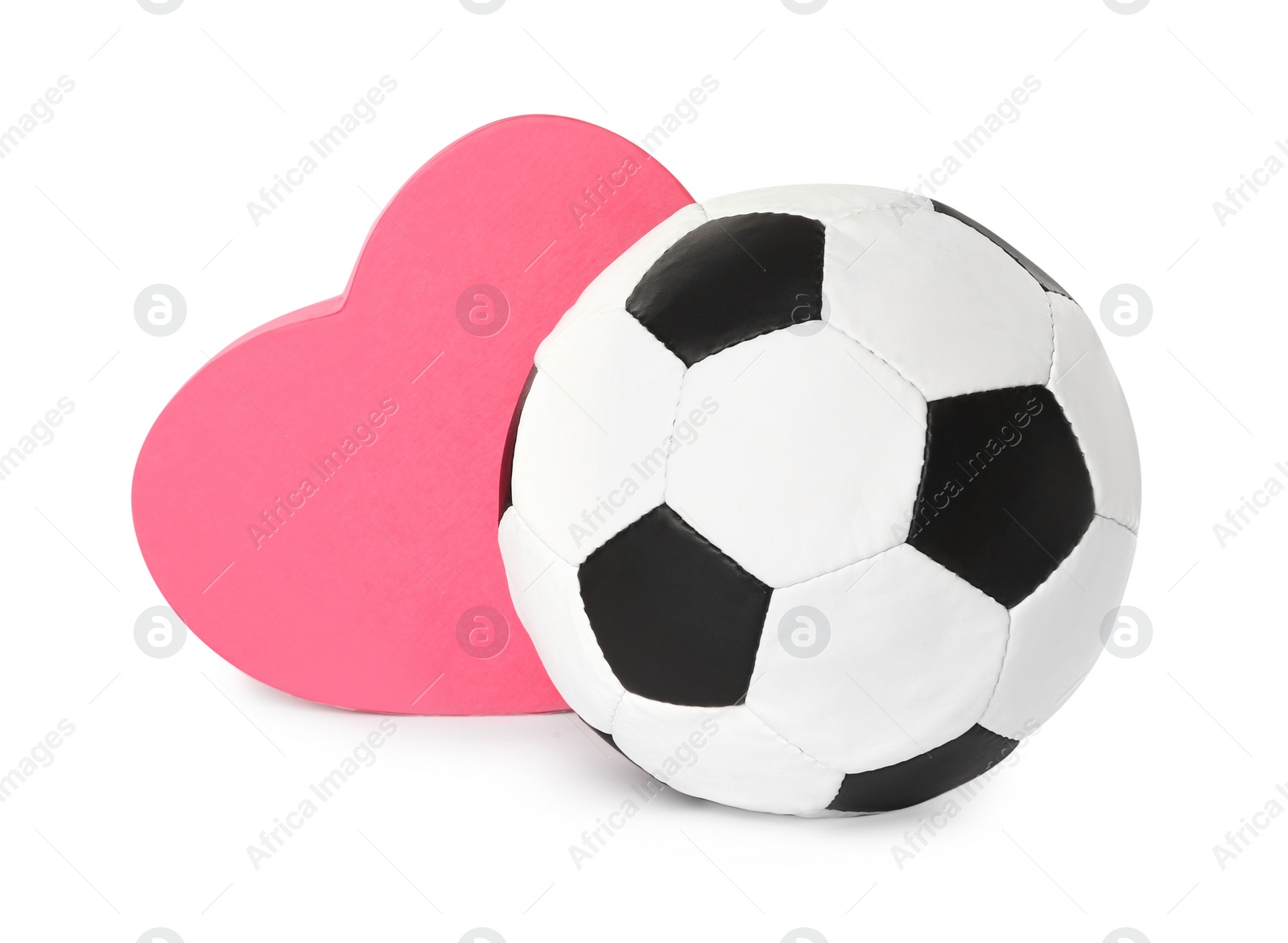 Photo of Soccer ball and heart on white background