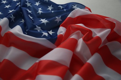 Photo of Flag of USA on white table, closeup