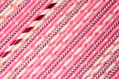 Many paper drinking straws as background, top view