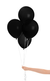 Black Friday concept. Woman holding bunch of balloons on white background, closeup