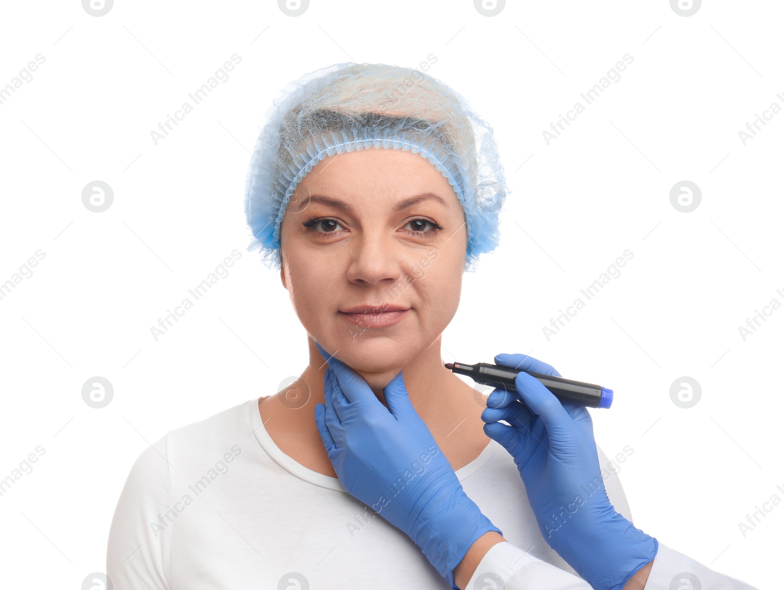 Photo of Surgeon with marker preparing woman for operation against white background. Double chin removal