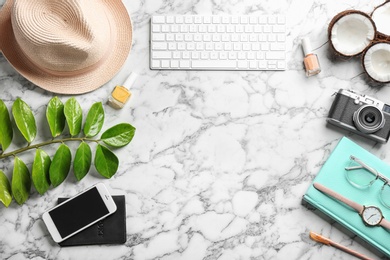 Flat lay composition with keyboard, blogger's stuff and space for text on marble background