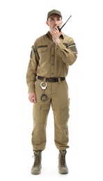 Male security guard using portable radio transmitter on white background