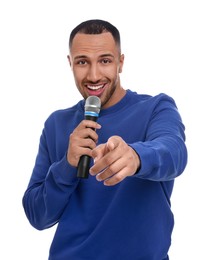 Photo of Handsome man with microphone singing on white background