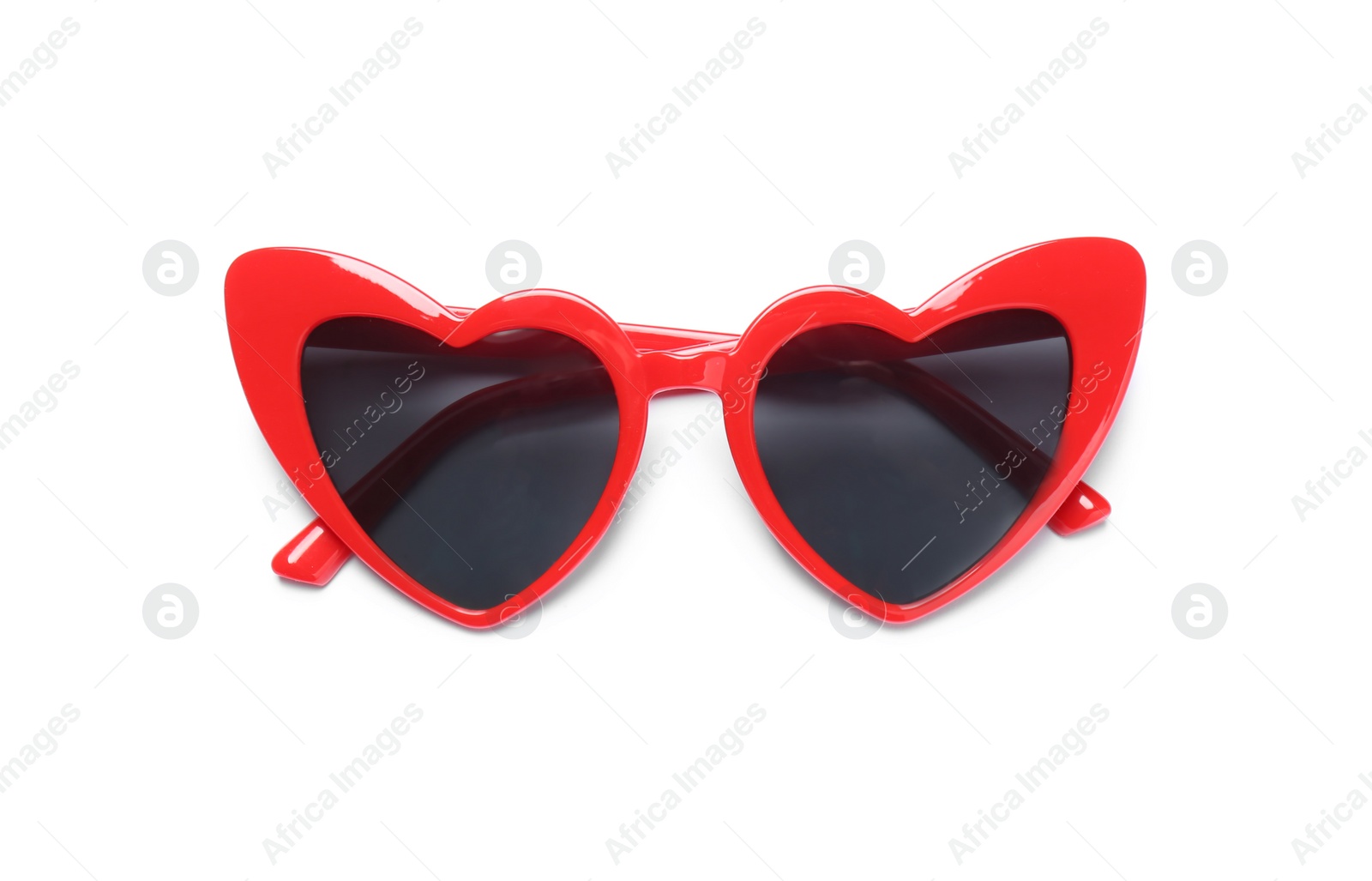 Photo of Stylish heart shaped glasses on white background