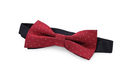 Stylish burgundy bow tie with polka dot pattern on white background