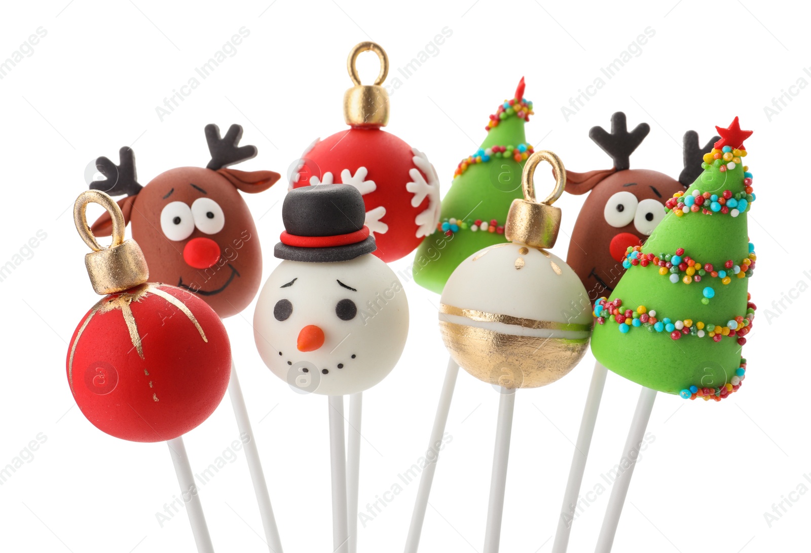 Photo of Delicious Christmas themed cake pops isolated on white