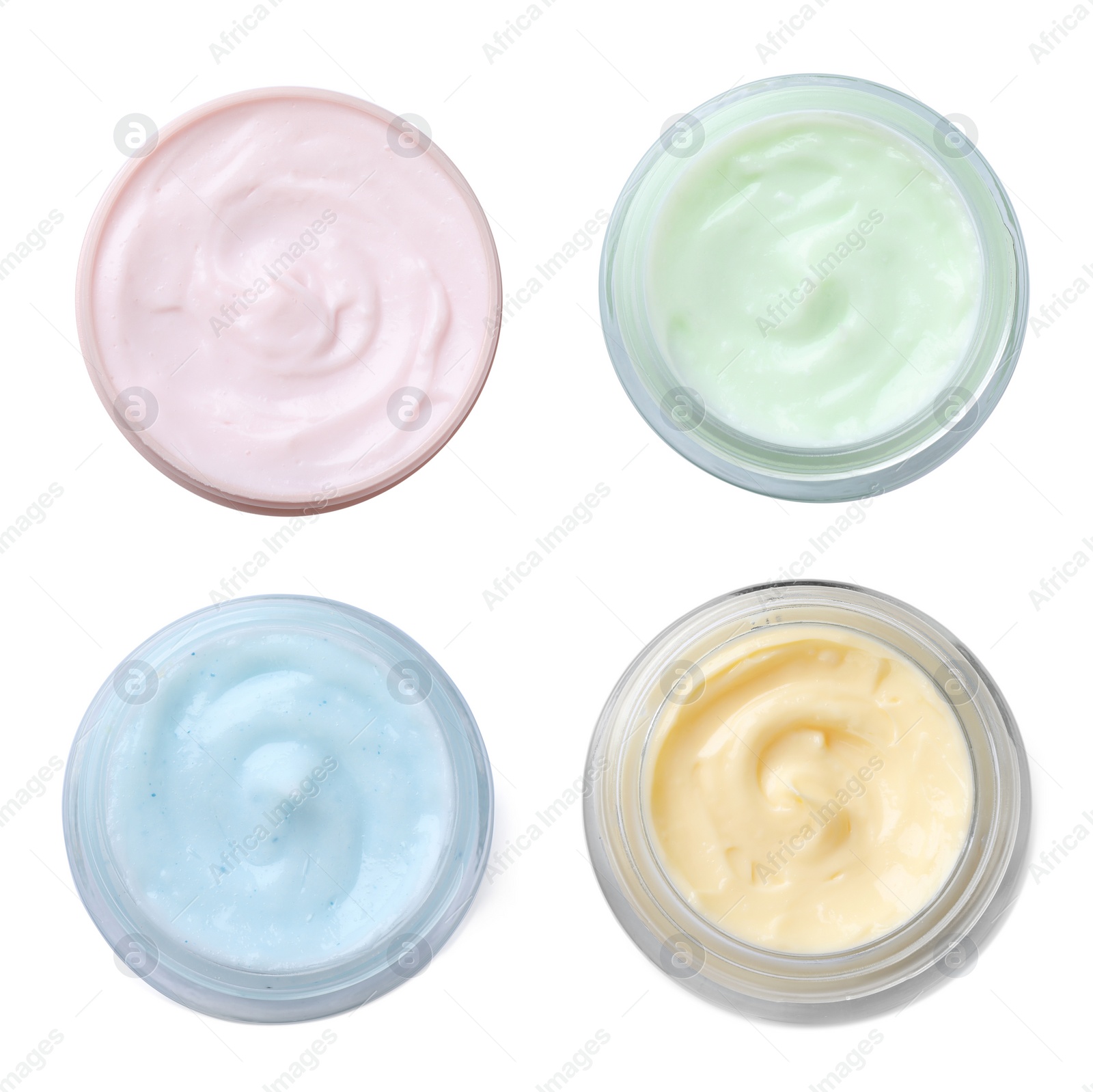 Image of Set with jars of body cream on white background, top view