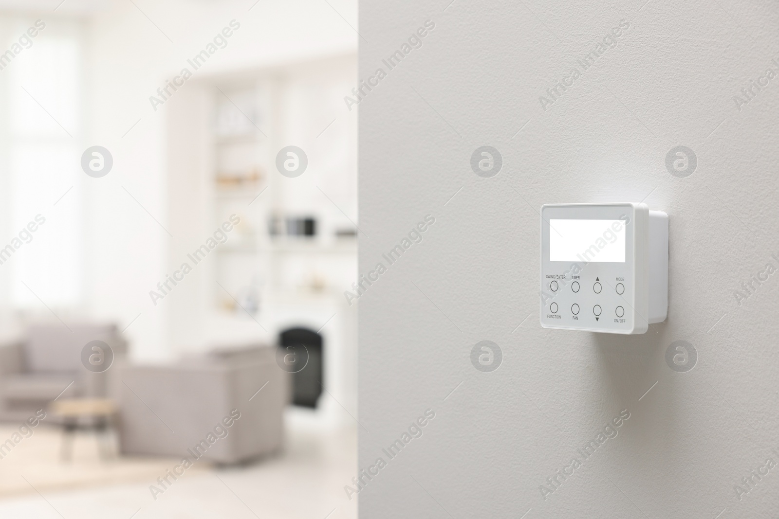 Photo of One thermostat on white wall indoors, space for text. Smart home system