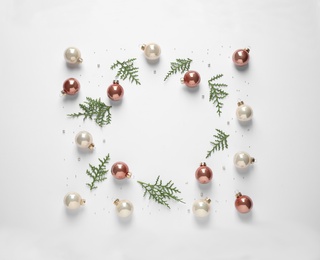 Flat lay composition with Christmas decorations on white background