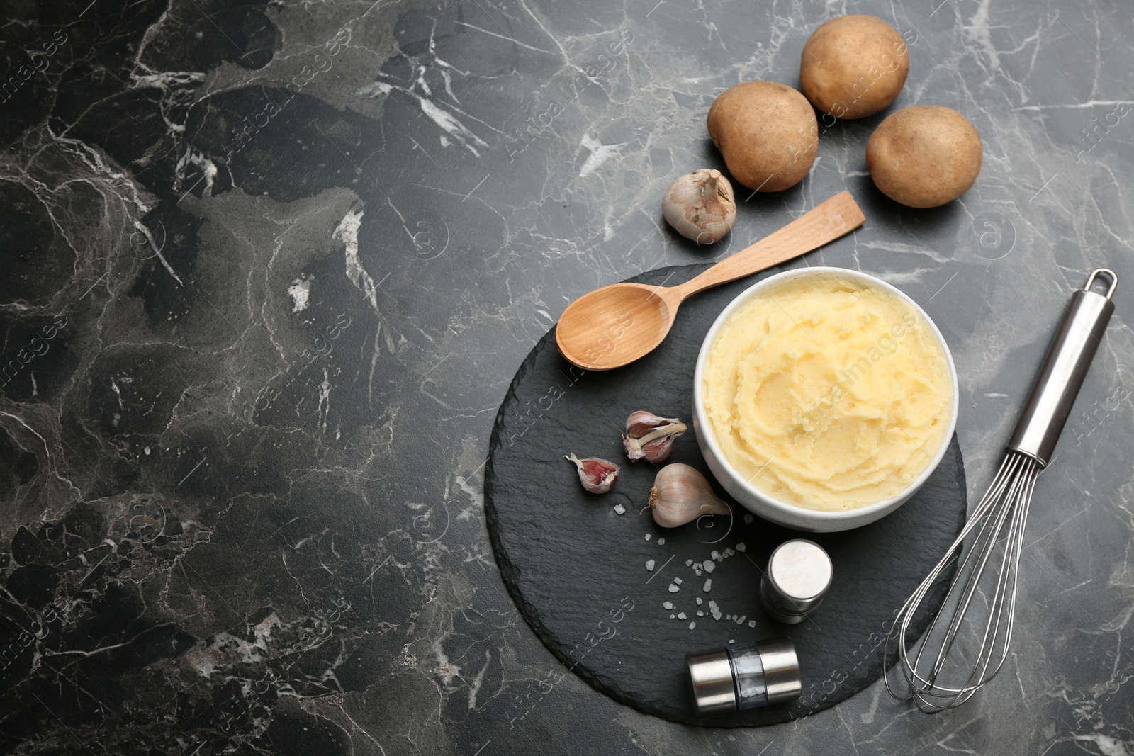 Photo of Flat lay composition with mashed potatoes and space for text on marble background