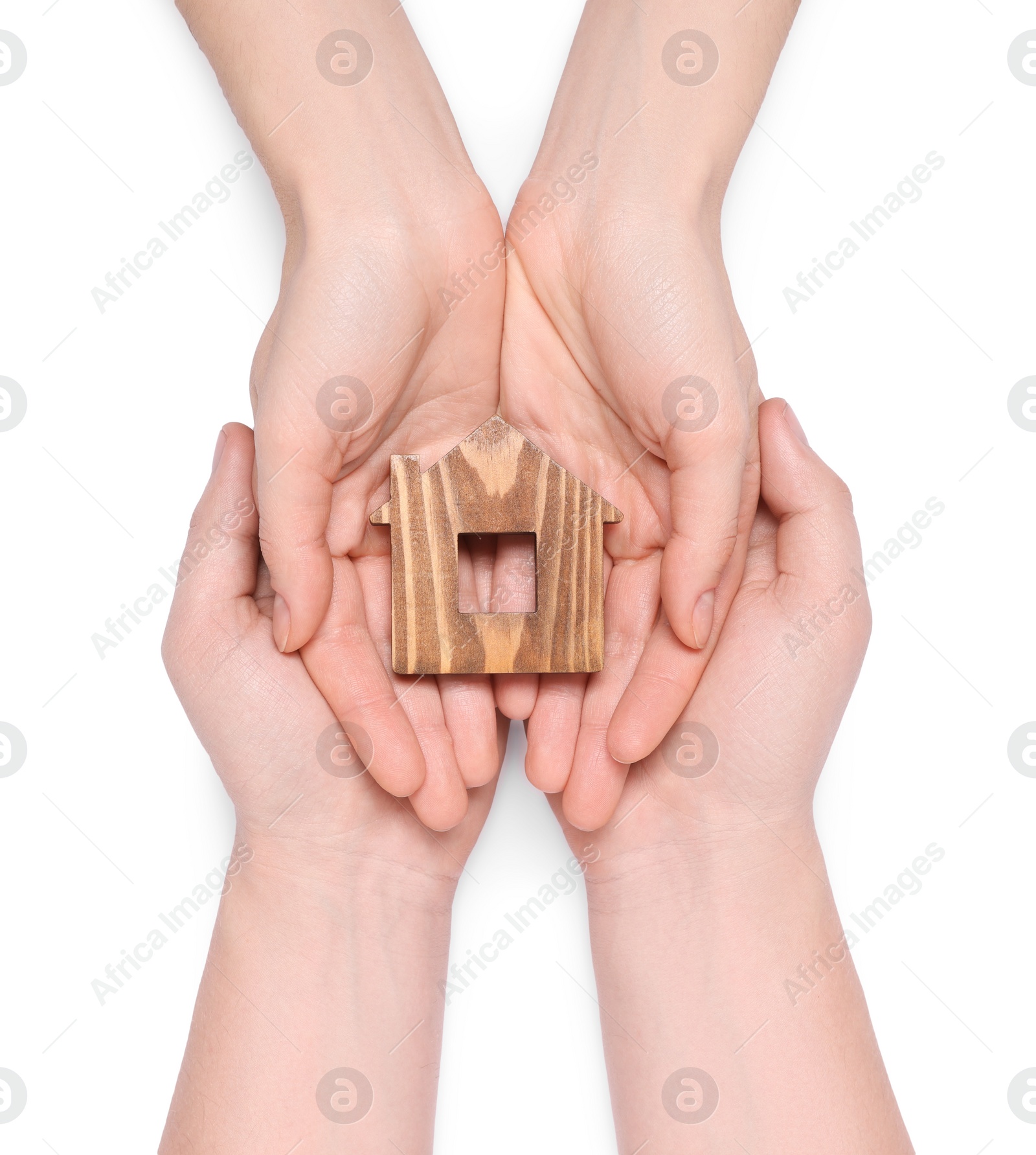 Photo of Home security concept. Couple holding house model on white background, top view