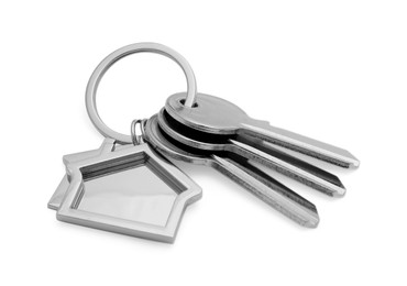 Photo of Keys with keychain in shape of house isolated on white
