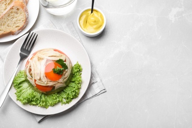 Photo of Delicious chicken aspic served on light table, flat lay. Space for text