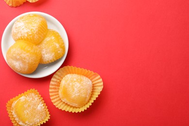 Photo of Delicious mochi on red background, flat lay with space for text. Traditional Japanese dessert